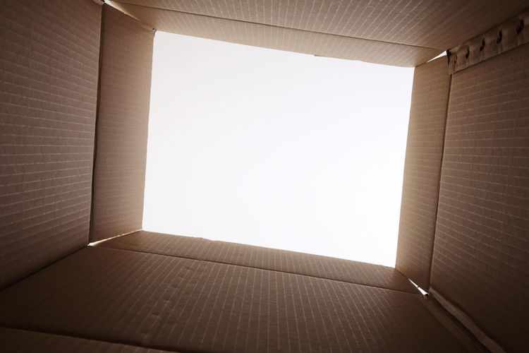 Open cardboard box against white background