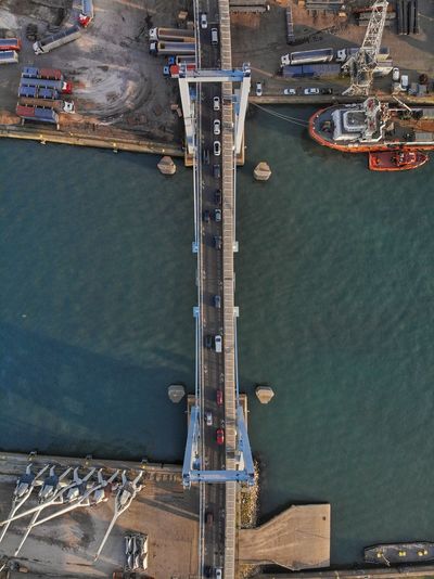 Directly above shot of bridge over river at dock