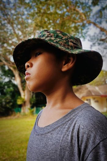 Portrait of a young boy looking away