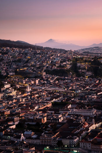 High angle view of city at sunset