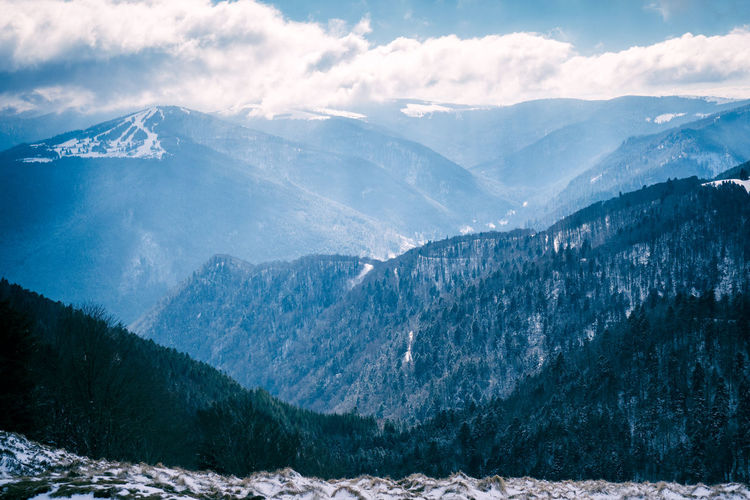 Scenic view of mountains against sky