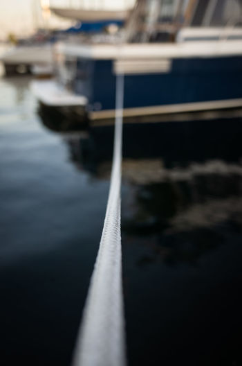 Close up a rope tied to a boat