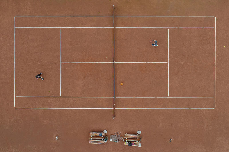 Aerial view of athletes playing tennis