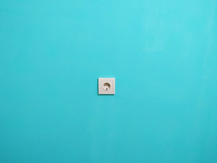 Minimum. socket on the background of a bright wall.