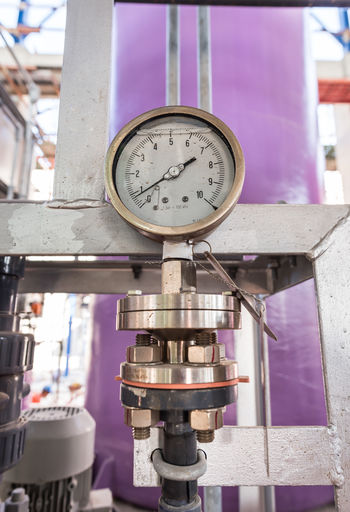 Close-up of pressure gauge at factory
