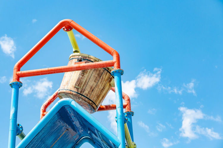 Low angle view of bucket at water park