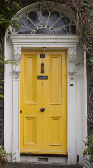 Yellow door of house