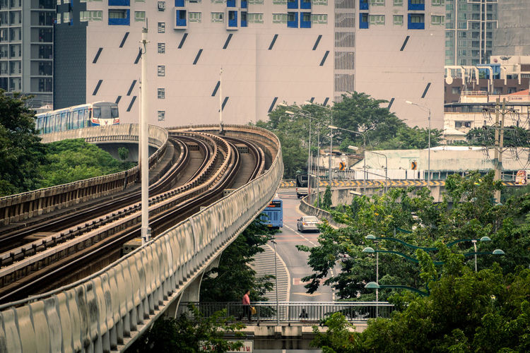 High angle view of railroad tracks by buildings in city