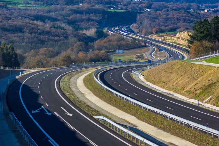 High angle view of empty highway passing through countryside