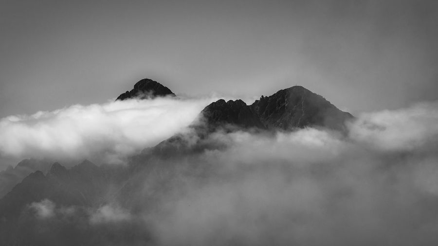 Scenic view of majestic mountains against sky