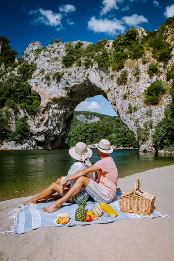 Couple sitting on breach
