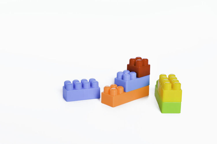Close-up of toys against white background