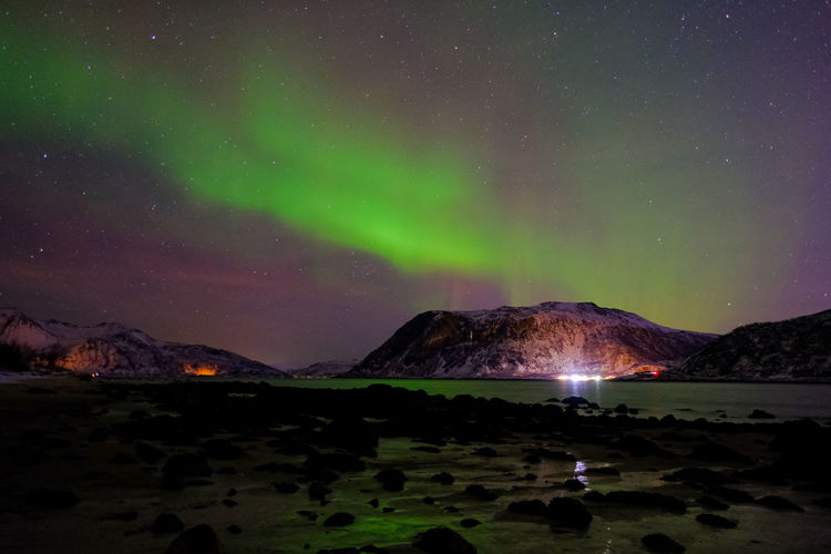 Scenic view of sea against sky at night