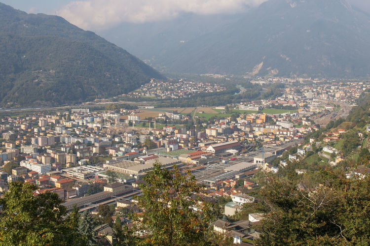 High angle view of townscape and mountains