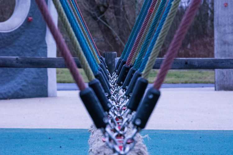 Close-up of metallic cables on playground