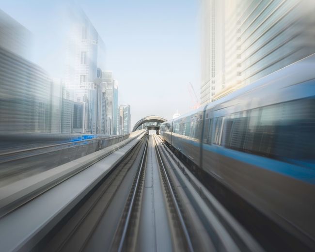 Blurred motion of subway train in city