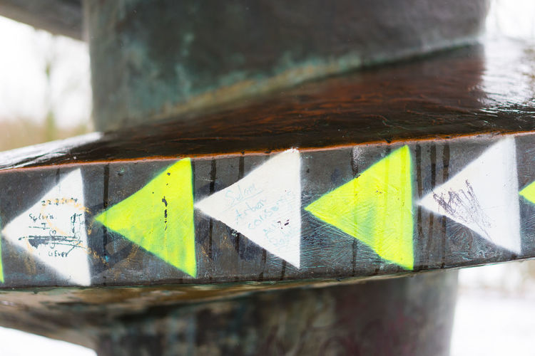 Close-up of arrow sign