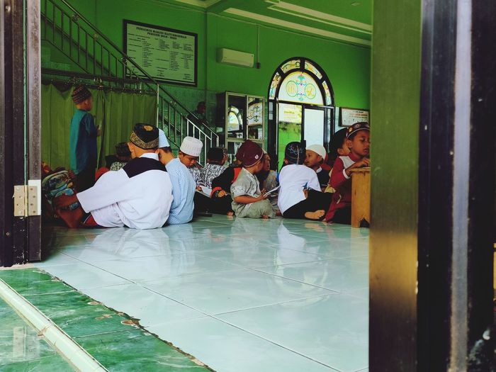 People sitting in temple