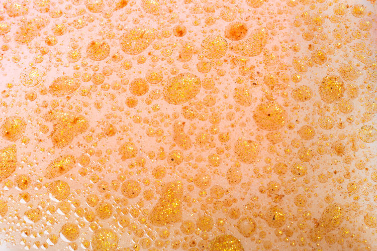 Full frame shot of yellow bubbles