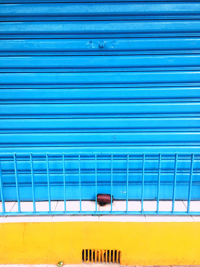 Closed shutter of all blue window