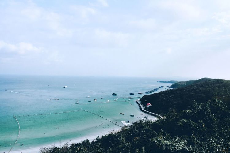 High angle view of road by sea against sky