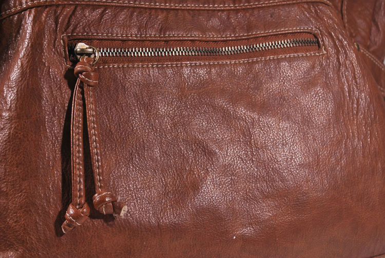 Full frame shot of brown purse