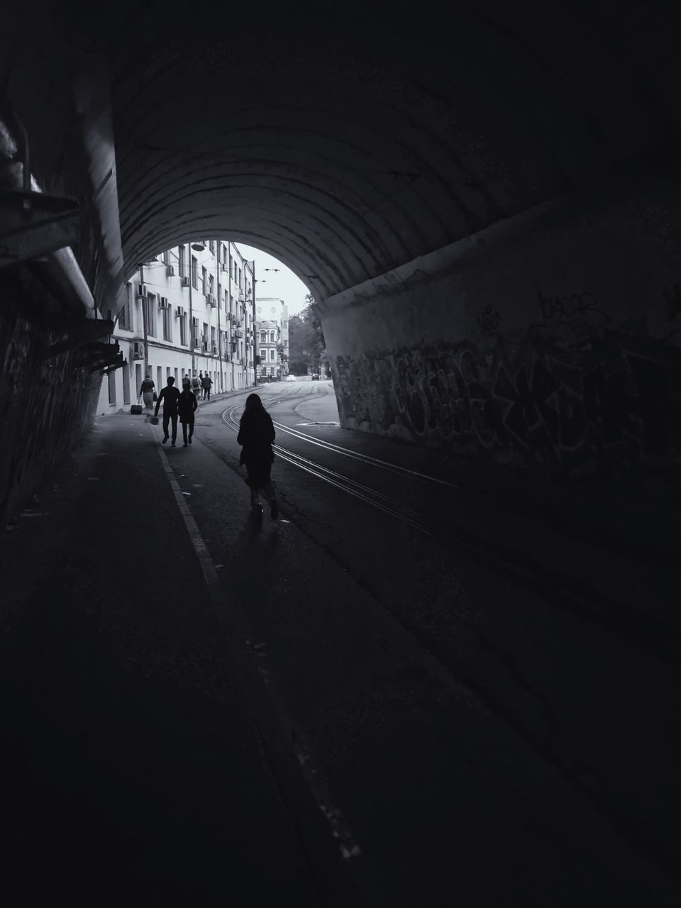 PEOPLE IN TUNNEL