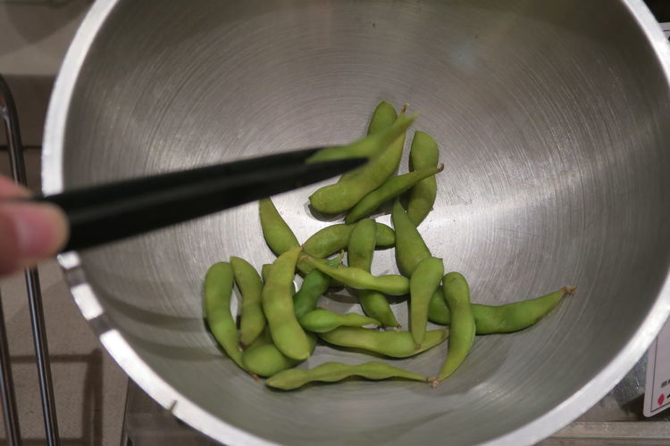 High angle view of green beans in container