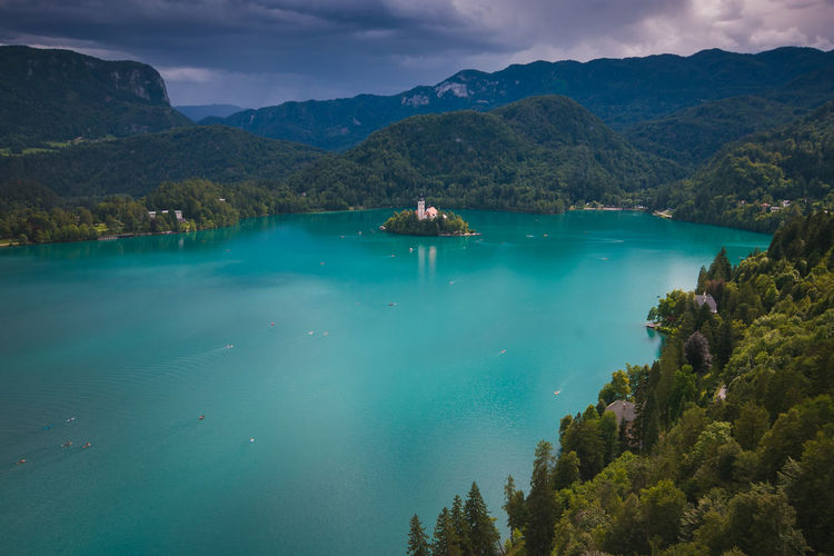 Panoramic view of little island in the bled lake during summer storm in slovenia