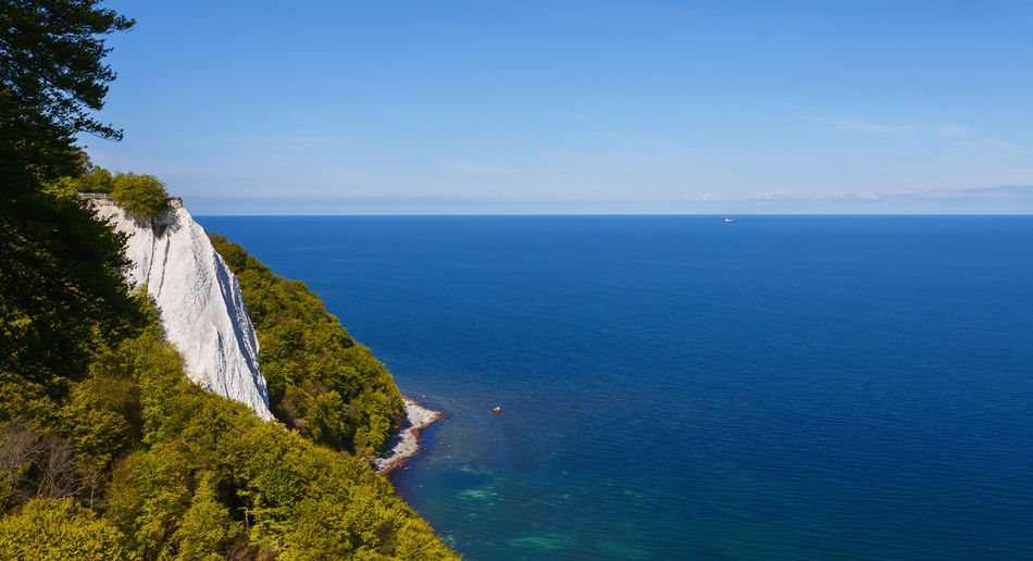 Serene scenic seascape shot from a steep rocky seashore