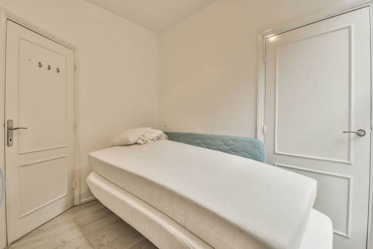 Mattresses in closed room