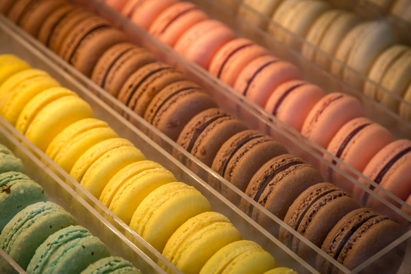 Close-up of colorful macroons in kitchen for sale