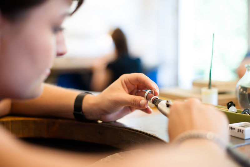Craftsperson working in wedding ring workshop