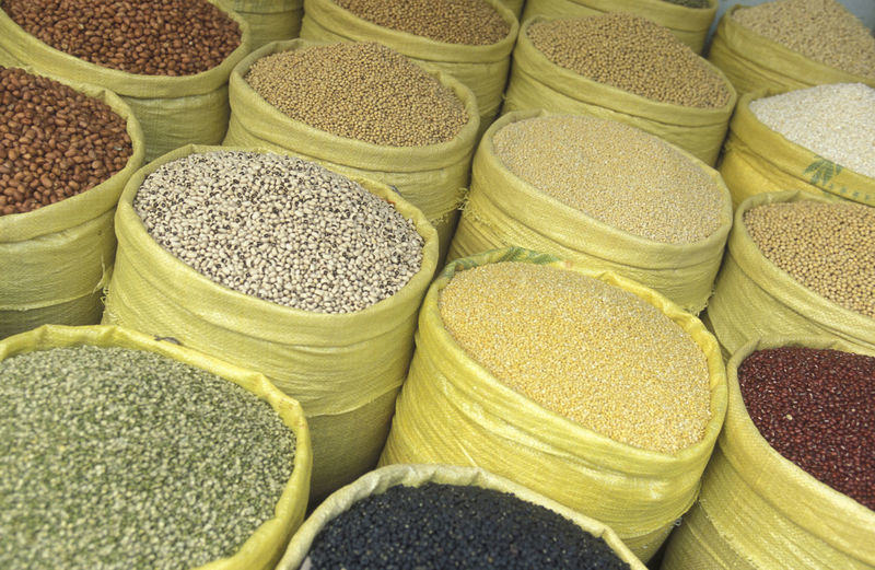 High angle view of legumes in sacks at market