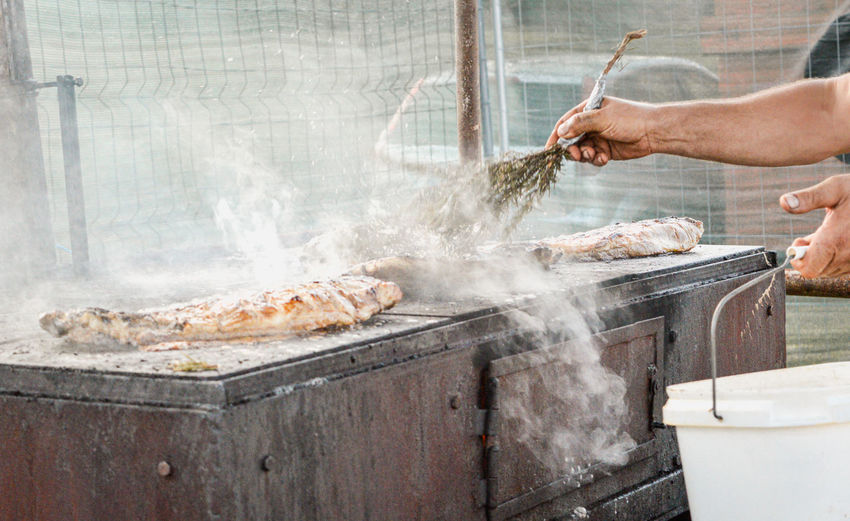 Man preparing barbecue meat 