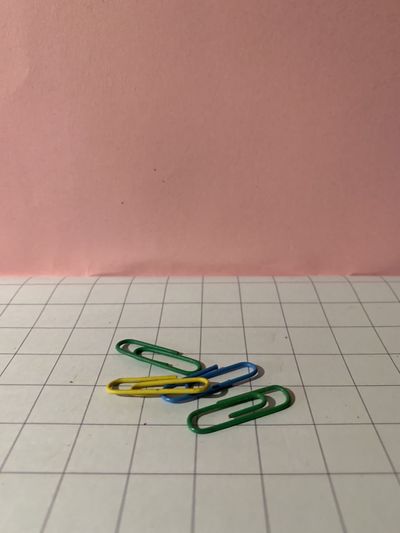 High angle view of multi colored pencils on tiled floor