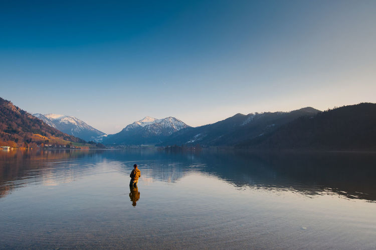 Man standing in lake