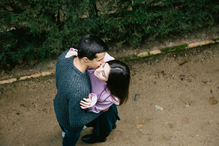 High angle view of couple kissing