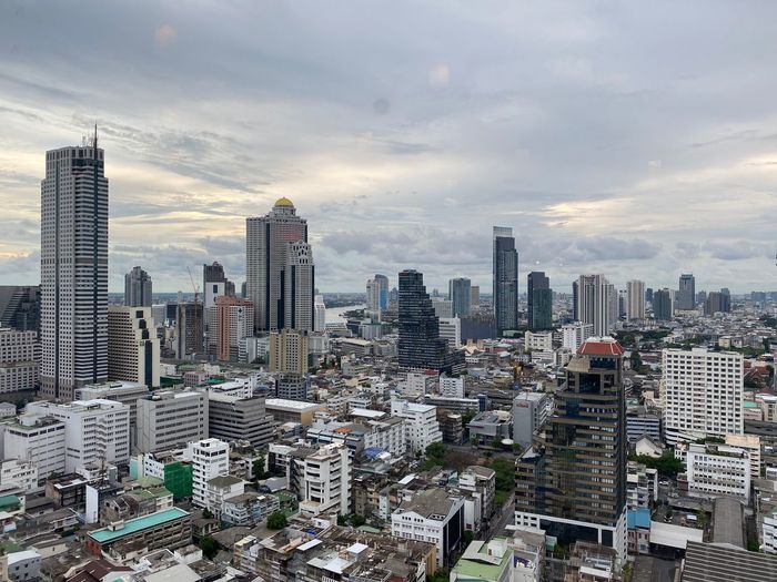 Bangkok city skyline high angle view towards grand state tower dome rooftop