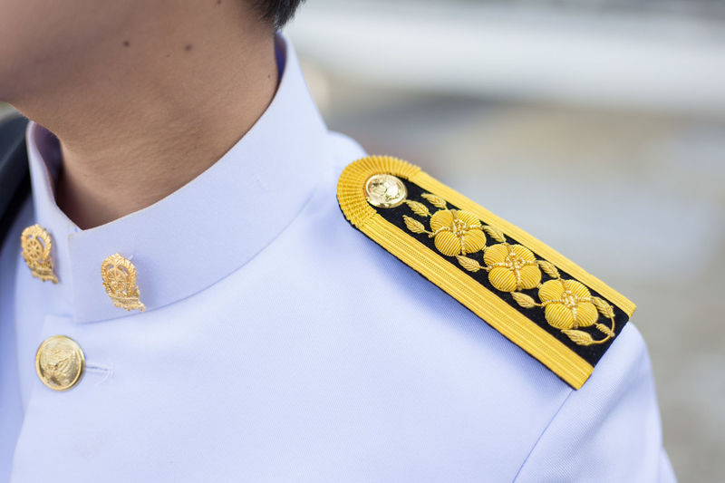 Midsection of military man wearing uniform