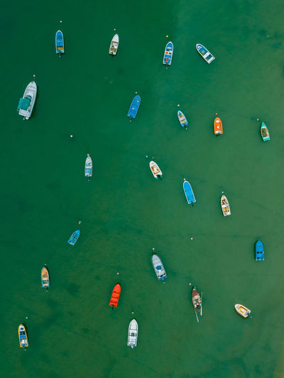 High angle view of fishing boats moored at sea