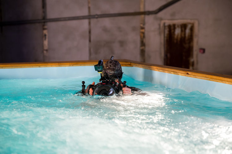 Man taking picture while diving