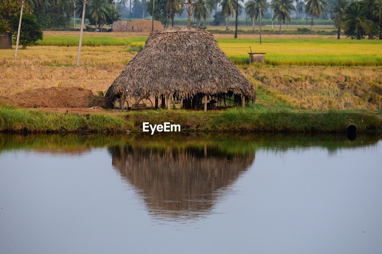Bicycle parked over a poorman's hut