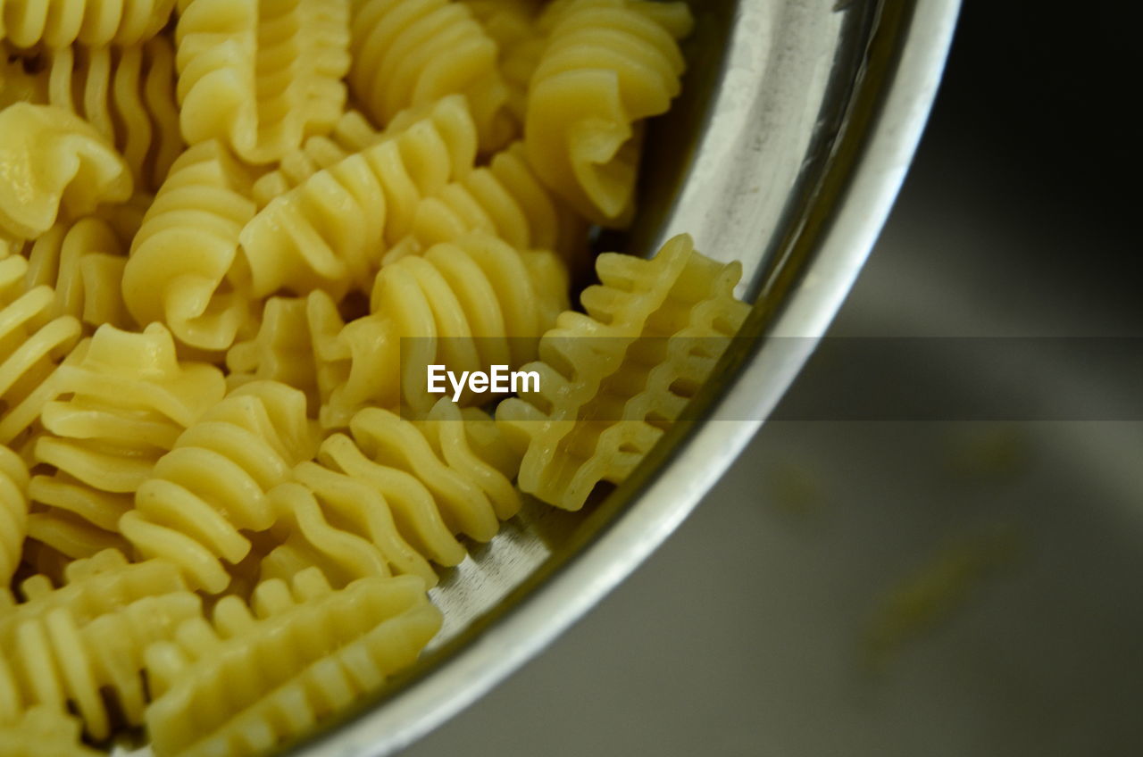 HIGH ANGLE VIEW OF PASTA IN CONTAINER