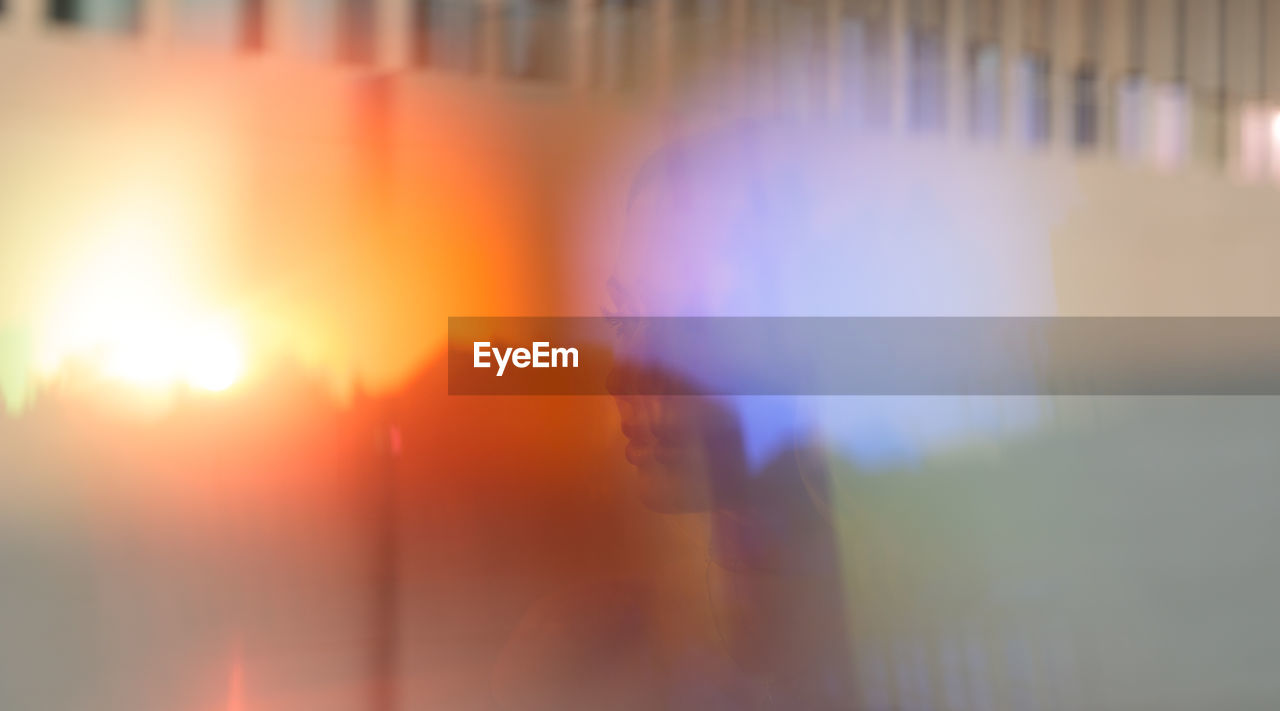 Defocused image of sun shining through window