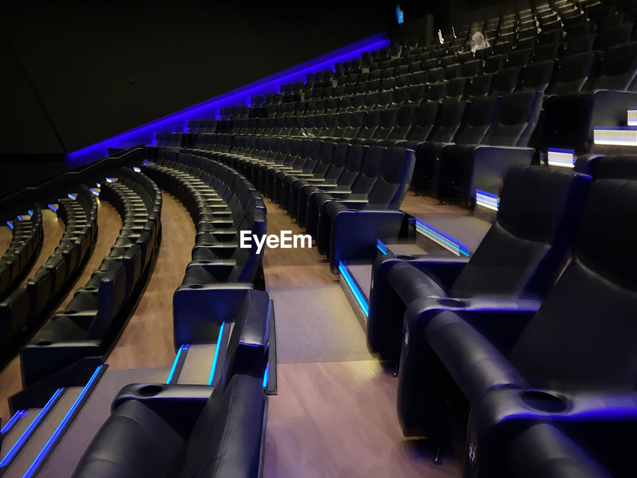 auditorium, sport venue, seat, in a row, indoors, arts culture and entertainment, no people, sports, chair, stage, theatre