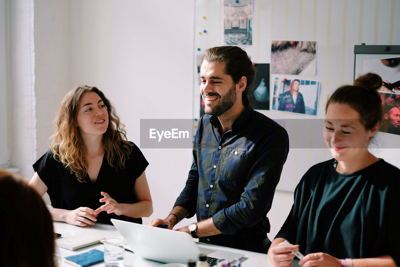 View of people in office meeting