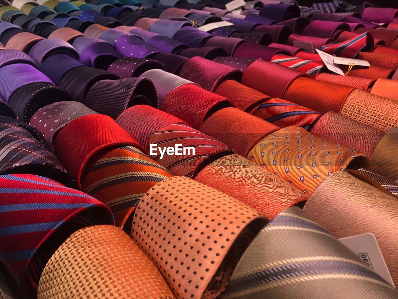 Close-up of ties in row