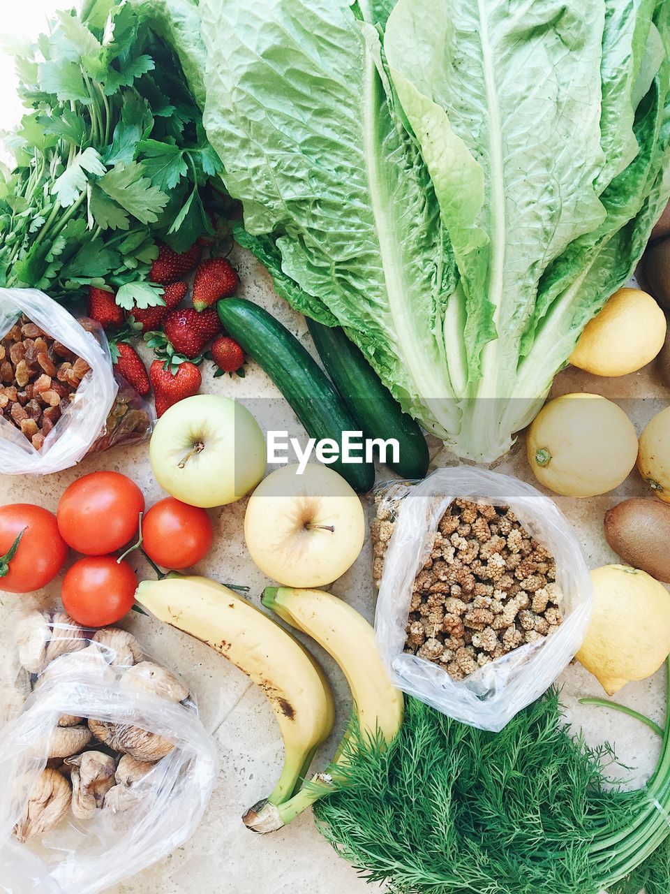 Directly above shot of various fruits and vegetables on table