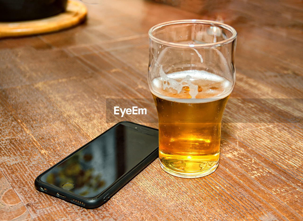 high angle view of beer in glass on table